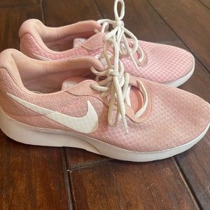 Pink Nike athletic tennis shoes for women. Size 6